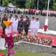 Meski Diguyur Hujan, Merah Putih Tetap Berkibar Gagah di Langit Mimika